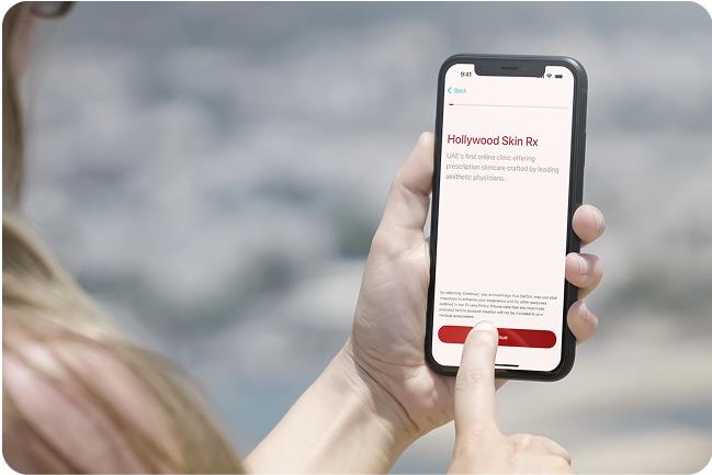 Person booking IV drip on phone